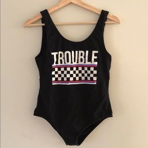 “Trouble” w/ checkered pattern bodysuit